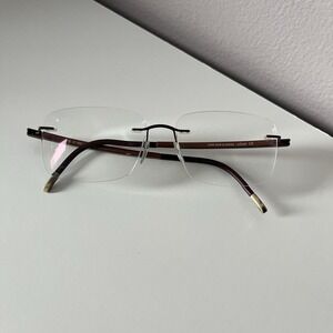 Silhouette Rimless Titanium SPX Frames 7642 40 6055 Brown Burgundy 17x135